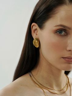 Step into a world of elegance with our Spiral Stud Earrings. These gold-textured, geometric beauties bring a touch of abstract art to your everyday look. Their unique circle design spirals with charm, making them a perfect gift. Gold Swirl Metal Earrings, Gold Plated Spiral Earrings, Modern Gold Spiral Jewelry, Spiral Gold-plated Earrings, Gold-plated Spiral Earrings For Gift, Gold Plated Spiral Earrings As Gift, Gold Spiral Minimalist Earrings, Gold Plated Spiral Earrings For Gift, Minimalist Gold Spiral Earrings