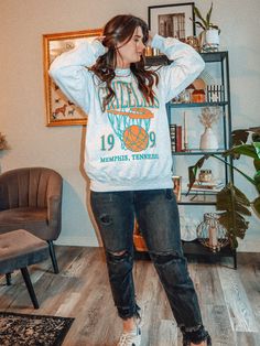 Show the love for your favorite team in this Memphis Basketball oversized sweatshirt that is inspired by vintage 90s NBA tshirts!- Screen print transfer that is heat pressed onto each tshirt- High quality, 90s oversized fit sweatshirt - Oversized fit | Model is 5’9” wearing a size XS/S- Sizing translation: XS/S = L , S/M = XL , L/XL = 2XL , 2XL/3XL = 3XL - - Cotton / Polyester Blend**due to screens & filters color may vary from pictures** Oversized Sweatshirt For Game Day And Sports Season, Oversized Sweatshirt For Game Day, Oversized Fan Apparel Sweatshirt For College, Oversized Varsity Sweatshirt For Game Day, Oversized College Sweatshirt For Fan Apparel, Throwback Sweatshirt For Game Day, Oversized Graphic Print Sweatshirt Fan Apparel, College Throwback Style Sweatshirt With Screen Print, Throwback College Sweatshirt With Relaxed Fit