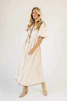 from family pictures to fall date nights, this lace up puff sleeve dress does it all, (+ then some). with its vintage-inspired shape + faux leather seam details, it pairs perfectly with boots, heels, or flats. two tone linen // midi length, scoop neckline, front tie closures, back zipper closure, elastic cuffs, faux leather seam + tie detailing model is 5'8" + wearing a small measurements are approximate + taken while laying flat xsmall : bust 33" length 49" small : bust 35” length 49” medium : Maxi Lace Skirt, Eyelet Top, Puff Sleeve Dress, Date Nights, Boots Heels, Button Cardigan, Lace Maxi, Puffed Sleeves Dress, Zip Up Sweater