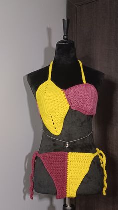 This crochet yellow with pinkish-red ombre swimsuit features a unique lemon-shaped cup design that is both fun and flattering. The handmade yarn crochet offers a comfortable and stretchy fit, while the pinkish-red ombre color pattern adds a stylish touch. Perfect for a day at the beach or pool, this swimsuit is sure to turn heads with its one-of-a-kind design. Handmade Pink Swimwear For Vacation, Handmade Pink Swimwear For The Beach, Handmade Fitted Pink Swimwear, Pink Crochet Swimwear For Vacation, Handmade Multicolor Beachwear Swimwear, Fitted Multicolor Crochet Swimwear, Handmade Multicolor Swimwear For Beach Season, Handmade Multicolor Swimwear For Vacation, Ombre Swimsuit