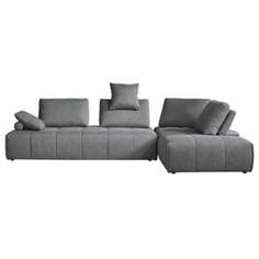 a gray couch with pillows on top of it