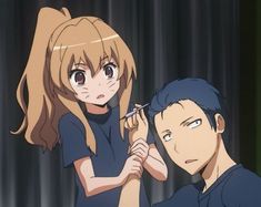 two anime characters one is brushing the other's hair while the other looks on