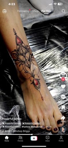 a person with a tattoo on their foot is shown in this screenshote image