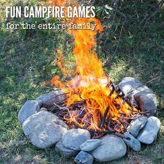 a campfire with rocks and firewood in the middle that says fun campfire games for the entire family