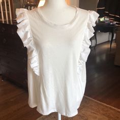 Bcbgmaxazria White Linen T-Shirt With Satin Ruffle Detail. Fabric Is 55 Linen/45 Rayon, Hand Wash Cold. The Perfect Dressy White T!! Size Xl White Ruffled Crew Neck T-shirt, Chic Short Sleeve Cotton Top With Crew Neck, Chic Crew Neck T-shirt For Casual Day Out, Chic Crew Neck T-shirt For Day Out, Chic Crew Neck Top With Ruffles, Crew Neck Top For Spring Brunch, Chic Ruffled Crew Neck Tops, Summer Ruffled Relaxed Fit T-shirt, Spring Crew Neck Top For Brunch