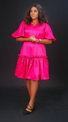 The Rose Dress. Product Details Gorgeous Pink Puff-Sleeve Midi Dress Bold Color and frills come together in this effortlessly elegant midi dress. Overview V-neck. Short puff-sleeves. Square-cut back with smock detailing. Free Dress Frilled hem. Fit & Sizing Midi length. Fabric & Care 100% Cotton. Machine Wash. Imported. Elegant Midi Dress, Free Dress, Elegant Midi Dresses, Tulip Dress, Free Dresses, Rose Dress, Dress 16, Bold Color, Square Cut