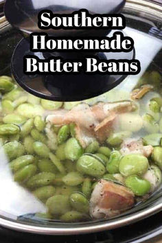 a bowl filled with green beans and chicken being stirred by a ladle to make southern homemade butter beans