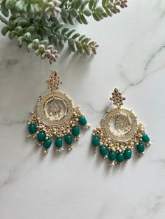 Baali chandbali earrings Stylish designer earrings Kundan, faux pearl and beads detailing Swipe through for colour selection 9cm in length Handcrafted in India Any questions please feel free to ask Festive Mirror Work Chandbalis For Reception, Party Chandbali Chandelier Earrings With Cutdana, Cutdana Chandbali Chandelier Earrings For Party, Green Chandbali Danglers For Party, Party Chandbali Cutdana Chandelier Earrings, Bollywood Beaded Earrings For Wedding And Diwali, Festive Stone Work Chandelier Earrings For Reception, Festive Chandelier Earrings With Stone Work For Reception, Mirror Work Jhumkas For Diwali Reception