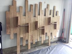 a wall made out of wooden planks in a garage