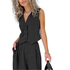 This sleeveless suit vest paired with wide-leg pants is your go-to ensemble for sleek sophistication and comfort. 2-piece Pinstripe Vest And Pants Set Pattern: Pinstripe Button Sleeveless Vest Waistcoat Pants: Pleated, Zipper Closing, Pockets Wide Legged Pants, Trousers Fitting: Regular Fabric: 97% polyester; Spandex 3%, Size: S, M, L Gender: Female Age: Adult Sleeve length: long sleeve Colors: Black, Almond, Squirrel Brand Name: NoEnName_Null Product ID: CJLS198858809 Note: All sizes are smalle Sleeveless Summer Pantsuit For Office, Summer Sleeveless Pantsuit For Office, Sleeveless Summer Office Pantsuit, Summer Sleeveless Office Pantsuit, Chic Striped Summer Vest, Chic Striped Spring Vest, Elegant Striped Vest For Spring, Elegant Pinstripe Sleeveless Vest, Formal Striped Sleeveless Vest