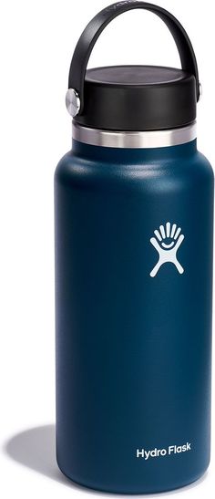 the hydro flask water bottle has a black lid and is blue with white logo