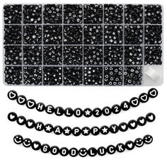 black and white beads are arranged in rows on a white background with the words happy birthday spelled