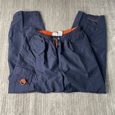 Vintage 2000s Athletic Works Multiple Pocket Basic Essential Streetwear Y2K Aesthetic Navy Cargo Pants Waist Large Mens Condition: Fair Used Condition = Has stains on both pant legs due to wear and age. Measurements: Please see photos above for all measurements IF YOU BUY TWO OR MORE ITEMS USE THE CODE BUNDLE @ CHECK TO SAVE 20% WE SHIP WITHIN 24 HOURS AFTER PURCHASE! Please be aware that we do not offer free returns!! The Buyer is responsible for the cost of the return label.  Follow us on TikTok & Instagram @findsnostalgic and tag us in your finds 90s Style Sports Pants With Pockets, 90s Sporty Pants With Pockets, Aesthetic Navy, Navy Cargo Pants, Streetwear Y2k, Vintage 2000s, Y2k Aesthetic, Cargo Pants, Mens Pants