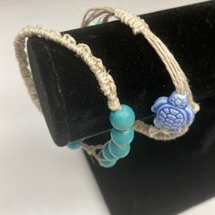 Girls Handmade Macrame Hemp Bracelet And Anklet Natural Colored Hemp Macrame Anklet Adjustable 2 Ceramic Turtle Beads In Shades Of Blue 5.5” Tightened 9.5” Stretched -And- Natural Colored Hemp Macrame Bracelet Adjustable Island Blue Wood Beads Approximate 6.5” Tight Approximately 8” Loose Hemp Does Have Slight Stretch With Wear. Turtle Bead Bracelet, Macrame Anklet, Hemp Macrame, Ceramic Turtle, Hemp Bracelet, Hemp Bracelets, Island Blue, Kids Accessories Jewelry, Girls Handmade