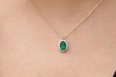 "Emerald Necklace / 14k Classic Oval Cut Emerald with Surrounding Diamonds / Natural Emerald Necklace in 14k Solid Gold / Mothers Day Gift / Birthstone Necklace * If you would like to see the Matching Earrings Please Click Below https://www.etsy.com/listing/604292239/emerald-earrings-14k-oval-cut-emerald?ref=related-4 * If you would like to see the Matching Ring Please click Below https://www.etsy.com/listing/604242111/emerald-ring-14k-classic-oval-cut?ref=related-2&ep_click=1 Item Features