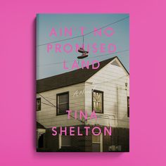 a pink book cover with an image of a house on the front and bottom corner