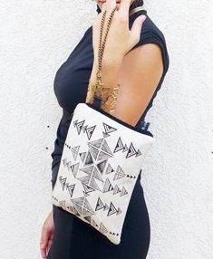 "Black and white cocktail party clutch. Gift wrapped handmade printed clutch can match any black outfit or casual outfit. Boho clutch, Linen purse, black & white, triangles pattern, screen print, linen, Boho clutch, Purse, bohemian bag, native american, Zipper clutch, makeup bag, printed textile, pretty packaging. ♥Limited edition If you wish to feel special with original taste this purse is perfect for you All designs are handmade printed with screen print technic. Perfect for your personal Bohemian Black Pouch Clutch, Black Bohemian Pouch Clutch, Bohemian Black Clutch For Everyday Use, Handmade White Pouch Clutch, Handmade White Clutch As Gift, White Handmade Clutch For Gift, Handmade White Clutch For Gift, Handmade White Clutch For Everyday Use, Bohemian Summer Clutch As Gift