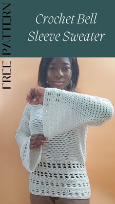 a woman wearing a white crochet sweater with the words free pattern on it