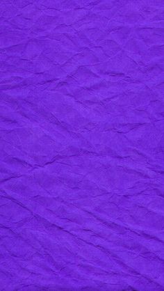 an image of a purple background that appears to be crinkled with wax paper