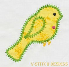 a yellow bird with green leaves on it's back and the words v - stitch designs