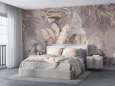 a bedroom with a bed, nightstands and wallpaper that has palm leaves on it