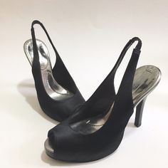 Never Worn And In Perfect Condition. Gorgeous Bcbg Max Azria Peep Toe Sling Back Pumps. Leather Silver Lining And Satin Black Outside. Heel Is Approx 4.5" With 1/2" Platform. *Smoke Free And Pet Free Home *Extremely Quick Shipping *Thank You For Your Support! Sleek Silver Slingback Pumps For Formal Occasions, Glamorous Black Slingback Pumps For Evening, Sleek Slingback Pumps For Party, Black Glamorous Slingback Pumps For Evening, Sleek Slingback Pumps With Round Toe For Party, Black Open Toe Slingback Pumps For Gala, Silver Slingback Heels For Night Out, Sleek Silver Evening Heels, Sleek Silver Heels For Evening