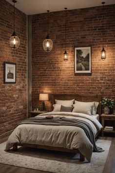 a bedroom with brick walls and two lamps hanging above the bed, along with an area rug on the floor