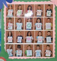 a group of children holding up signs with the words thank you