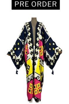 This kimono is everything and it's arriving just in time for the transition from summer to fall. Our Renee Cotton Style Multi-Color Kimono is a versatile addition to your wardrobe. Wear it as a chic cover-up at the beach, a stylish layer over your casual outfit, or a statement piece for a night out. The styling possibilities are endless, allowing you to express your unique fashion sense. Order now and get your kimono for the introductory price of $59.00 plus shipping. Chic Long Sleeve Beach Robe, Chic Open Front Kimono For Vacation, Multicolor Bohemian Robe For Spring, Bohemian Multicolor Robe For Spring, Multicolor Bohemian Spring Robe, One Size Kimono For Beach Season Day Out, One Size Kimono For Summer Day Out, One Size Kimono For Day Out During Beach Season, Free Size Kaftan For Spring Beach Cover-up