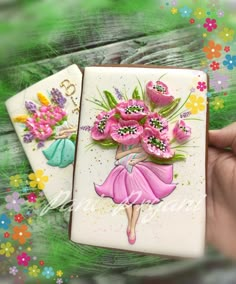 two handmade cards with flowers and a woman in a pink dress holding a flower bouquet