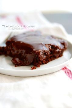 a piece of chocolate cake on a white plate