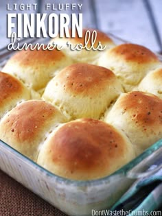 a casserole dish with rolls in it and the words light & fluffy enkon wheat dinner rolls