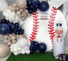 a baseball themed birthday party with balloons and cake