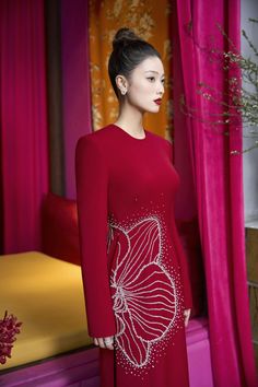 Indulge in the luxury of our Ao Dai. This exquisite piece features a sleek silhouette, long sleeves, and a gorgeous blend of velvet and satin fabrics. Elevate your style with this elegant and exclusive Ao Dai. Length: 150cm (Ao Dai), 110cm (Pants) Designer Long Sleeve Winter Dresses, Designer Long Sleeve Festive Dresses, Fitted Long Sleeve Dress For Red Carpet, Red Carpet Long Sleeve Evening Dress, Designer Long Sleeve Wedding Dresses, Glamorous Long Sleeve Dress For Red Carpet, Elegant Long Sleeve Dress For Red Carpet, Elegant Long Sleeve Red Carpet Dress, Chic Long Sleeve Red Carpet Dress