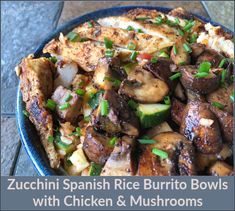 a blue bowl filled with chicken and mushrooms