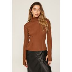 Brown ribbed knit (57% Viscose, 42% Nylon, 1% Spandex). Top. Long sleeves. Mock neck. Pull on. 21.5" Shoulder to hemline. Imported. Chic Ribbed Turtleneck Knit Top, Fitted Trendy Mock Neck Top For Work, Trendy Fitted Mock Neck Top For Work, Trendy Stretch Mock Neck Top For Workwear, Trendy Fitted Turtleneck Knit Top, Chic Ribbed Fitted Mock Neck Top, Ribbed Turtleneck Knit Top For Fall, Fitted Knit Mock Neck Top For Fall, Fall Ribbed Turtleneck Knit Top