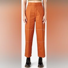 Look Stylish And Comfortable In These Dickies Women's Double Knee Pants. The Relaxed Fit And Straight Leg Style Make It Perfect For Work Or Casual Wear. The Pants Are Made Of High-Quality Materials That Ensure Durability And Long-Lasting Wear. The Burnt Orange Color Adds A Touch Of Vibrancy To Your Wardrobe. The Pants Are Available In Size 6 And Are Designed For Regular Size Types. See Pictures For Additional Details, And Feel Free To Ask Questions! Also Check Out My Other Listings For More Dick Double Knee Pants, Dickies Women, Orange Pants, Knee Pants, Dickies Pants, Burnt Orange Color, Look Stylish, Burnt Orange, Orange Color