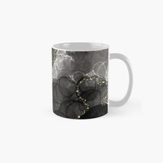 an abstract black and white background with gold accents classic mug