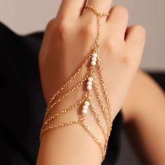 This Single Hand Chain Mitten Sleeve Is A Wonderful Addition To Your Wardrobe And Your Style! This Dainty And Delicate Boho Style Piece Is Very Unique And Classy And Can Be Worn On Either Your Right Or Left Hand! Flattering And Easy To Wear! This Piece Is A Hybrid Of A Ring And A Bracelet! Sure To Get Lots Of Compliments! Chains Bracelet, Rice Bead Bracelet, Fairy Bracelets, White Beads Bracelet, Hand Chain Jewelry, Boho Style Bracelets, Belly Dance Jewelry, Bracelet Accessories, Bracelets Design