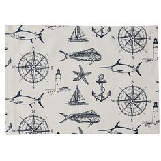 a blue and white area rug with an image of fish, ships, anchors and compass