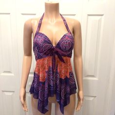 Womens Paisley Floral Print Sharkbite Flowy Halter Tankini Top Size Large. New Without Tags. Never Worn, Just Tried On. From Smoke Free Home. *Top Only. No Bottoms Included. This Beautiful Tankini Top Features A Stunning Paisley And Floral Pattern In Shades Of Purple And Red. The Halter Tie Strap Adds A Touch Of Elegance And The Tie Bow At The Bust Accentuates Your Curves. The Semi-Sheer Flowy Skirting Adds A Touch Of Sophistication While The Built-In Bra And Push Up Cups Provide Comfort And Sup Fitted Paisley Print Top For Beach, Free People Swim, Halter Top Tankini, Halter Tankini, Diy Fashion Clothing, Paisley Floral, Tie Bow, Flowy Skirt, Distressed Black Jeans