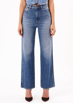 This is a high-rise, wide leg jean, made with a low stretch denim. Fits true to size. The Heidi: Tight around the seat but will soften with wear Features our signature back pocket stitching Specially angled and shaped in the back for a truly peachy looking butt Low stretch denim for a vintage look with the comfort of a stretch Zip closure Made with Rolla's vintage gold hardware The Measurement: Rise: 31 cm / 12 inch Inleg: 83 cm / 32 inch Hem: 49cm / 195 inch *Measurements for size 8 The Wash: Seattle is a worn in, authentic look wash Crafted with contrast tobacco stitching The Stretch: Comfort denim, sometimes known as 'comfort rigid' Slightly lighter weight than a rigid denim Designed for those who want an authentic vintage look to their denim with a little bit of stretch Comfort denim w Pocket Stitching, Romper And Jacket, Cardigan Shirt, Activewear Sets, Classic Jeans, Denim Branding, Sweater Tank Top, Denim Leggings, Denim Design