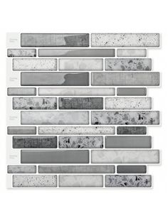 a white and gray mosaic tile wall