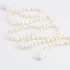 ON SALE The necklace is made of 9mm white color freshwater nugget pearls and 16-19mm white baroque pearls Item No: NK481 Material: freshwater pearls Shape:nugget shape and baroque shape Size: 9mm and 16-19mm Color: white Luster: good Skin: with flaws Quality: A Bead:silver 925 Hand Knotted: Yes Necklace length: 55inch,any other length you need Packing: beautiful gift pouch,ready for gift giving If you need other specific length according to your personal situation, please contact me freely, i wi White Baroque Pearl Lariat Necklace, Pearl Lariat Necklace, Pearl Lariat, Knotted Necklace, Baroque Pearl Necklace, Freshwater Pearls Earrings, Necklace White, Gift Pouch, Freshwater Cultured Pearls