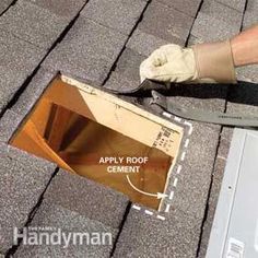 a person with gloves on working on a roof