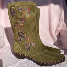 Rare Materia Prima By Goffredo Fantini Green Suede Boots Absolutely One Of A Kind, Have Not Been Able To Find Anything Else Like These!!!!! Add Serious Flair To Any Outfit -Gorgeous Rich Green Olive Suede. -Handcrafted In Italy. -1 1/4” Sturdy Wood Heel. -Calf Width 7”. -Stunning Rich & Vibrant Colorful Flower Embroidery & Hobnail Details, Beautiful Stitchwork Throughout! -Soft Buttery Leather Inside. -Brand New Condition. 10/10! -Beautiful Boho Style Boots!!! Unique & Made To Last A Lifetime! A Designer Spring Boots With Leather Sole, Green Suede Spring Boots, Green Suede Boots For Spring, Traditional Suede Boots With Round Toe, Designer Green Boots With Round Toe, Designer Almond Toe Boots For Spring, Green Suede Boots, Boho Style Boots, Faux Fur Handbag