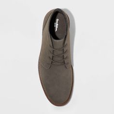 These Jerad Chukka Boots from Goodfellow & Co™ make a great pick, whether you're dressing for casual hangouts or a family event. The ankle closed-toe shoes with a textured upper with stitched detailing and a lace-up front are great for creating a sharp, stylish look. These medium-width shoes feature cushioned insole construction for enhanced comfort and are great for both special occasion and everyday wear. Goodfellow & Co™: Where style & fit are always in good company. In Good Company, Vegan Boots, Closed Toe Shoes, Rubber Boot, Family Event, Lace Up Ankle Boots, Family Outfits, Toe Shoes, Toe Designs