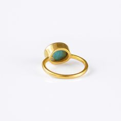 This beautiful stackable bezel set ring is made with oval faceted natural Sleeping Beauty Turquoise gemstone in 18K Vermeil Gold. The ring has a 925 stamp. Gemstone size is 8 x 12 mm. Please note that each turquoise stone is natural and can vary slightly in color and natural inclusions. This ring is available in two finishes: ✦ 18K VERMEIL GOLD ✦ ROSE GOLD ✦ BRIGHT STERLING SILVER This ring is great for stacking and we have it along with other ring designs available in a variety of stones. Pleas Gold Turquoise Ring With Bezel Setting As Gift, Gold Turquoise Ring With Bezel Setting For Gift, Turquoise Ring With Bezel Setting, Turquoise Rings With Bezel Setting, Turquoise Bezel Setting Fine Jewelry Ring, Turquoise Rings With Bezel Setting In Fine Jewelry Style, Gold Turquoise Ring With Oval Cabochon, Turquoise Gemstone Moonstone Ring, Minimalist Gold Turquoise Gemstone Ring