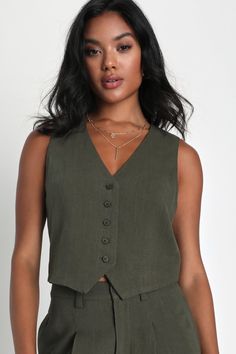 From SoHo to Spain, the Lulus Suits You Perfectly Olive Green Linen Vest is a stylish look that's sure to get you noticed! Lightweight, linen-blend fabric shapes this chic, vest-style top that has a functional five-button placket at front and finishes with cropped, angled hems. Pair with the matching pants for a complete look! Fit: This garment fits true to size. Length: Size medium measures 19.75" from shoulder to hem. Bust: Great for any cup size. Waist: Loosely Fitted. Undergarments: May be w Vest With Buttons, Green Tunic Dress, Olive Green Vest, Loose Vest, Casual Formal Dresses, Wrap Top Blouse, Linen Vest, Neutral Tops, Olive Green Shorts