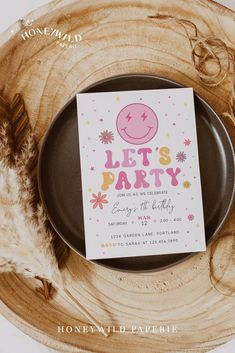 a party card sitting on top of a plate